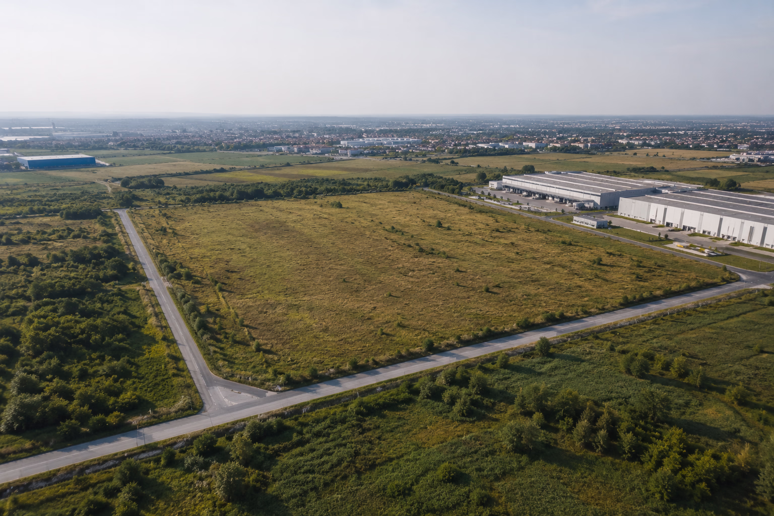 Commercial real estate advisors evaluating development land opportunities with investors and developers.